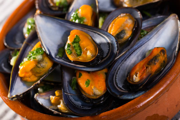 istock Image of mussels with sauce 1384883192