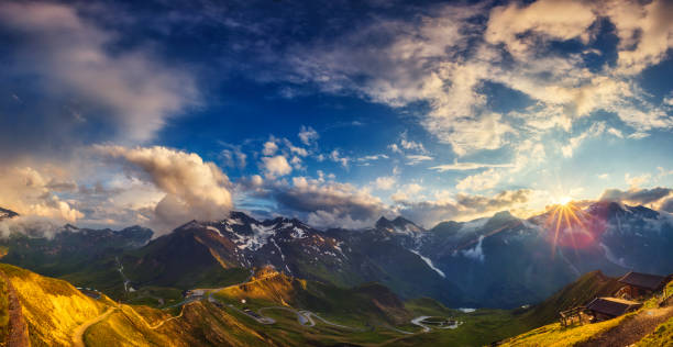 picturesque morning scene A great view of the hills glowing by sunlight at twilight. Dramatic and picturesque morning scene. Location famous Grossglockner High Alpine Road, Austria. Europe. Artistic picture. Beauty world. grossglockner stock pictures, royalty-free photos & images