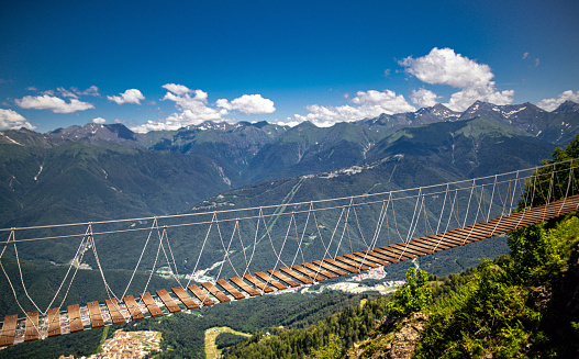 Empty rope bridge in the mountains