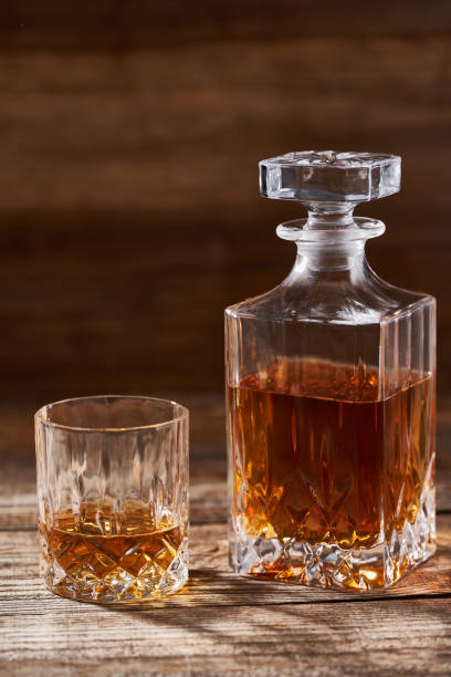 istock Bourbon on a wooden board 1384888115