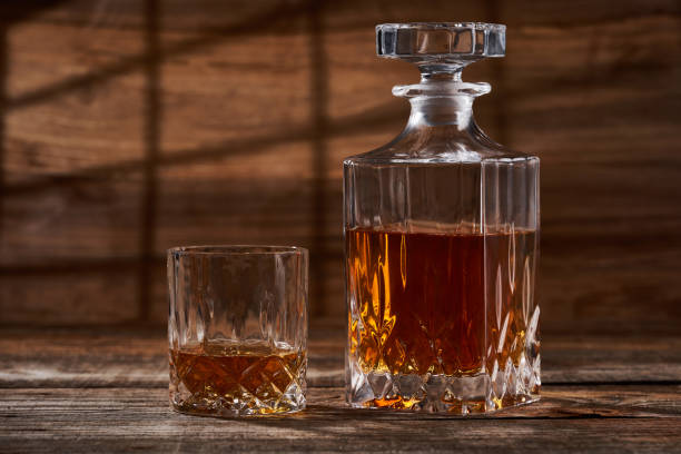 istock Bourbon on a wooden board 1384888116