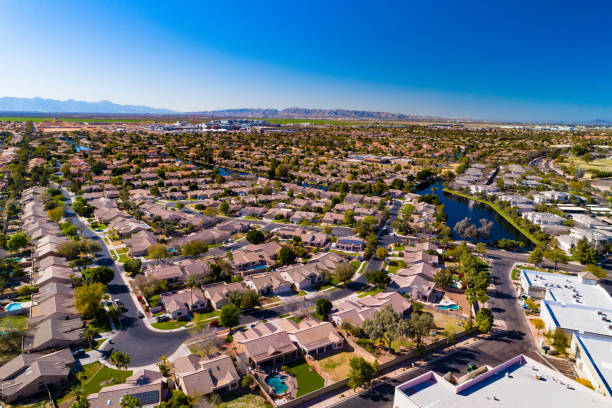 Chandler, Arizona Aerial Aerial of residential areas of Chandler, Arizona, with South Mountain and the Sierra Estrella mountain range in the distance.  Chandler is part of the Phoenix Metropolitan Area. chandler arizona stock pictures, royalty-free photos & images