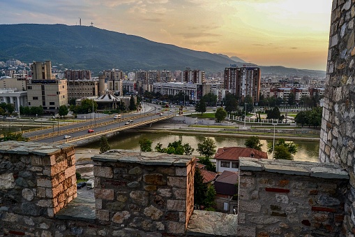 09.08.2018. Skopje, Macedonia. City view from ancient ottoman castle, vardar river and vodno mountain during sunset.