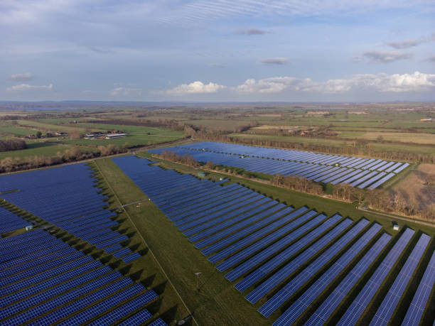 istock Solar Farm in rural countryside 1384892912