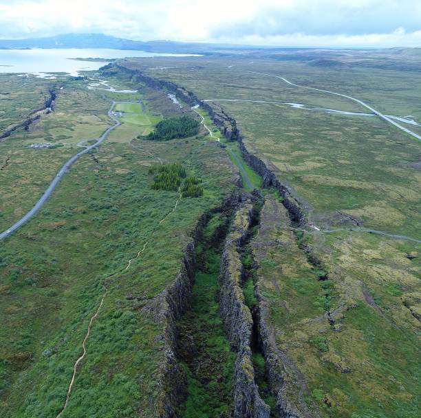 The Mid-Atlantic Ridge in Iceland.  This area is the boundary between the North American and Eurasian tectonic plates, which move apart ~ 2.5 cm/year over millennia.