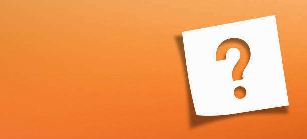 Note paper with question mark on panoramic orange background stock photo
