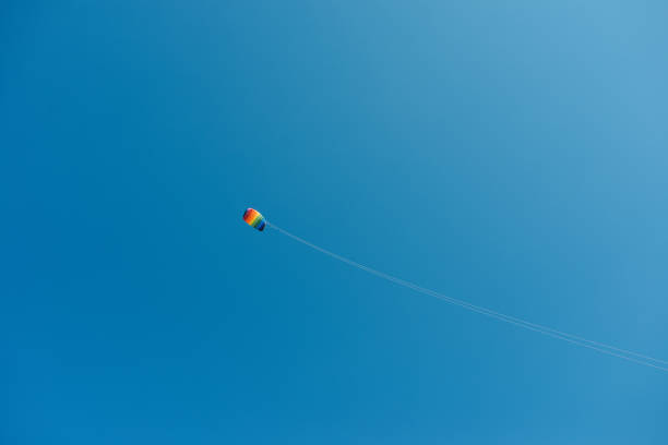 colorful rainbow kite in the blue sky