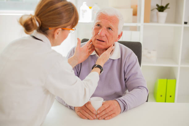 istock Senior man visiting doctor. 1384897488