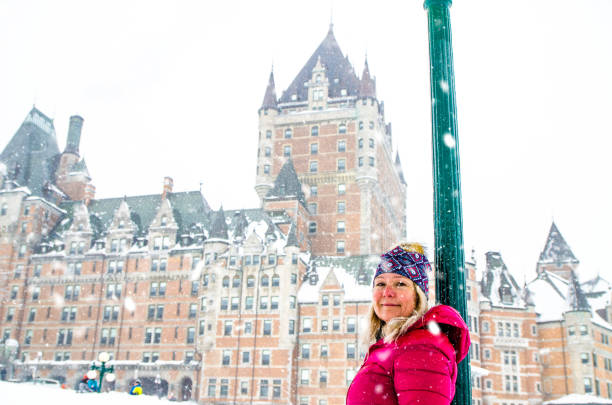 istock Woman in front of Chateau Frontenac 1384898293