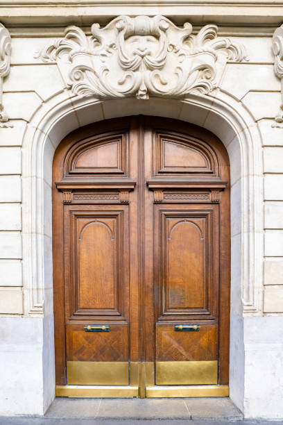 istock Paris, an ancient wooden door 1384898381