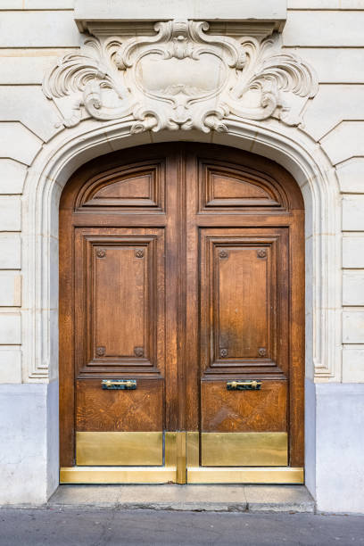 istock Paris, an ancient wooden door 1384898399