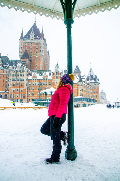 istock Woman looking at Chateau Frontenac 1384898540