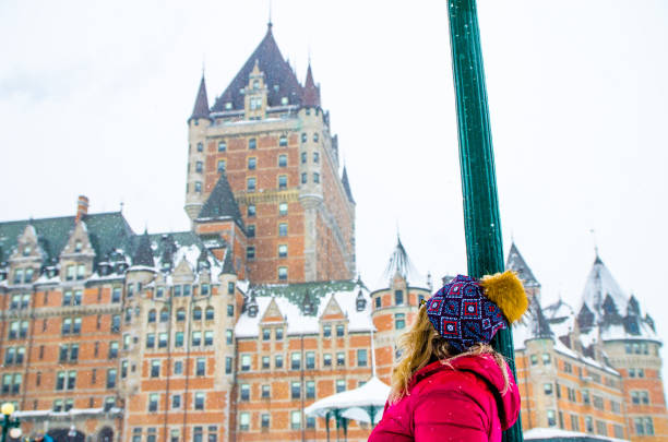 istock Woman looking at Chateau Frontenac 1384898557