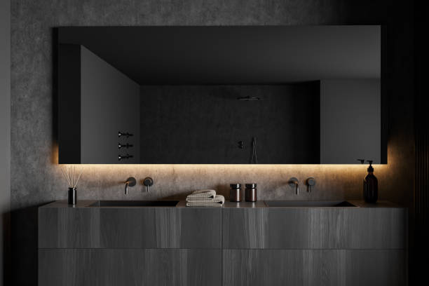 istock Dark bathroom interior with mirror and sinks, shower, grey walls 1384900248