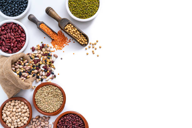 istock Assorted dried legumes isolated on white background copy space 1384900558