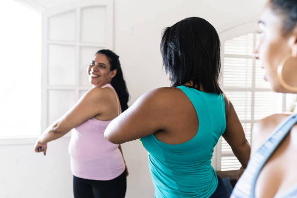 istock Women exercising at home 1384902792