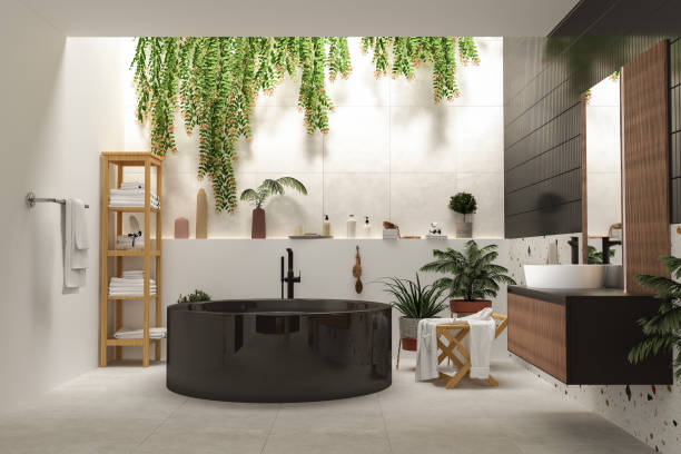 istock Cozy bathroom interior with grey floor tile, black bathtub, black vanity and square mirror, front view. 1384903918