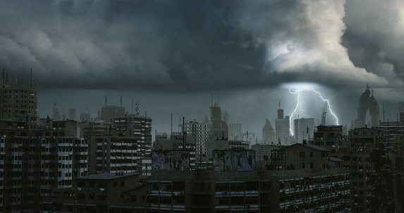 Digitally generated post apocalyptic scene depicting the consequence of a nuclear holocaust, showing desolate urban slums with tall buildings in ruins and mostly cloudy sky. \n\nThe scene was created in Autodesk® 3ds Max 2022 with V-Ray 5 and rendered with photorealistic shaders and lighting in Chaos® Vantage with some post-production added.