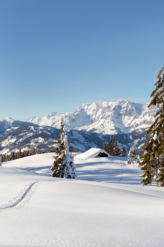 Scenic aerial view of Dolomites covered in snow in winter