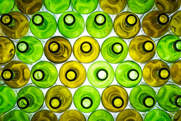 MANY WINE EMPTY BOTTLES. RECYCLING CONCEPT. TOP VIEW. MANY WINE EMPTY BOTTLES. RECYCLING CONCEPT. TOP VIEW. recycling bin photos stock pictures, royalty-free photos & images
