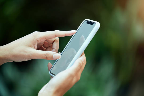 istock Shot of an unrecognizable business owner using a cellphone 1384927959