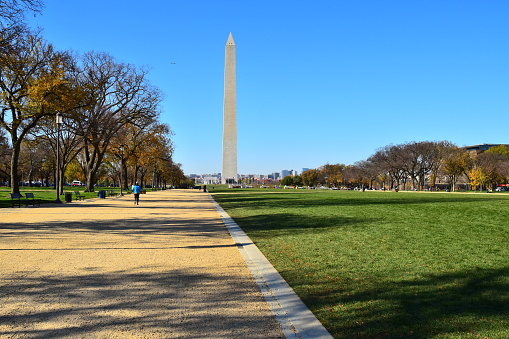 The Washington Monument rises above the Washington Mall in Washington, D. C. on a clear day as seen from the east.