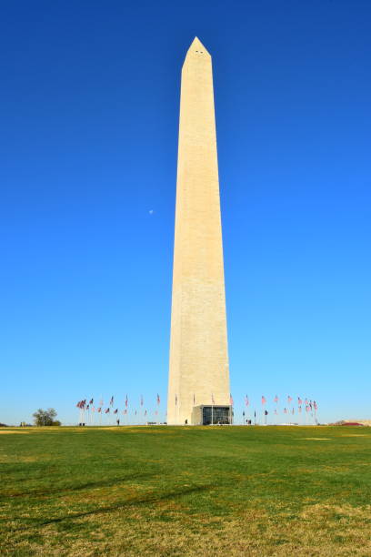 istock Washington Monument and the Moon 1384938185
