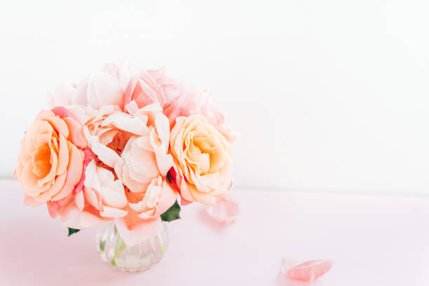 istock Fresh bunch of pink peonies and roses 1384947022
