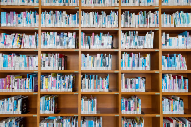 istock Books on shelves in library 1384958982