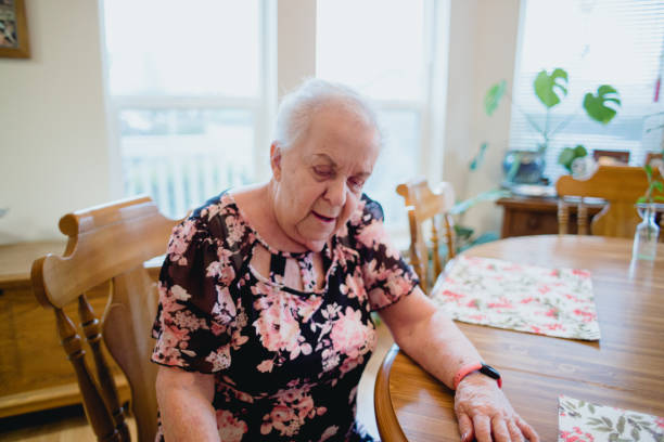 istock Senior Woman Relaxing at Home 1384961010