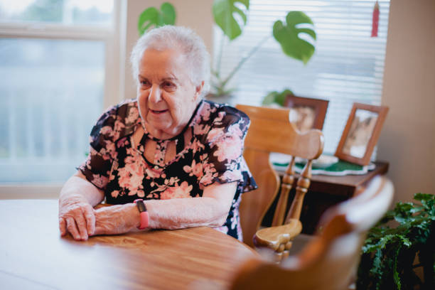 istock Senior Woman Relaxing at Home 1384961103