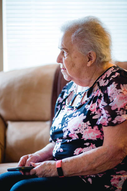 istock Senior Woman Relaxing at Home 1384961290