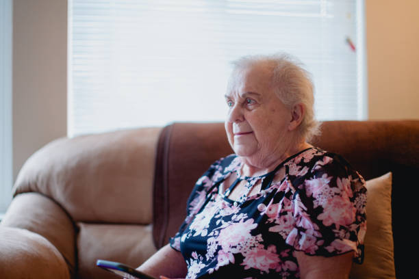 istock Senior Woman Relaxing at Home 1384961978