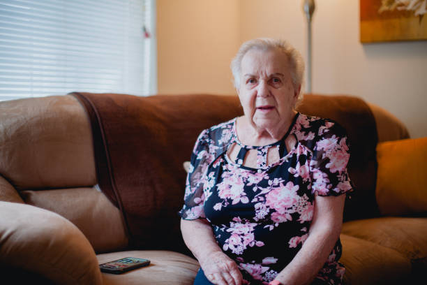 istock Senior Woman Relaxing at Home 1384962059