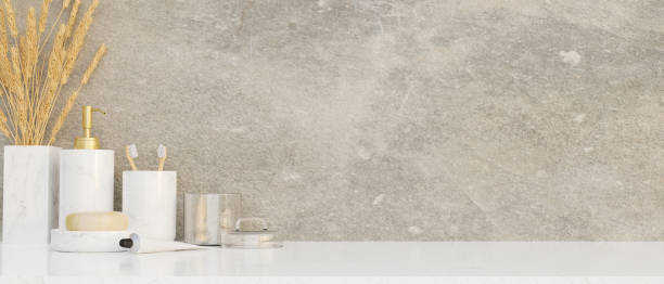 istock Bathroom countertop with luxury bathroom products container and copy space 1384971300