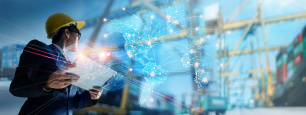 istock Businessman holding virtual interface panel of global logistics network distribution and transportation on container cargo ship harbor Smart logistics, Industry, Innovation future of transport 1384979702