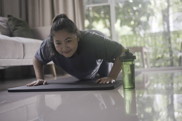 istock Asian Woman exercising 1384984819