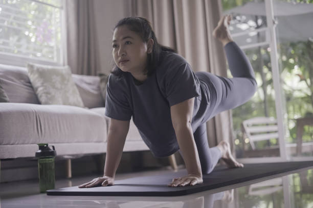 istock Asian Woman exercising 1384984961