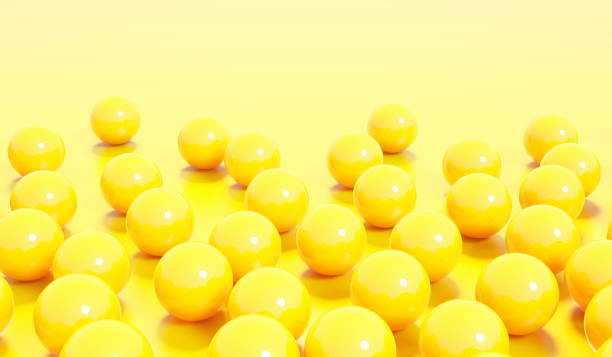 istock 3d render of abstract yellow spheres ball , abstract composition background 1384986939