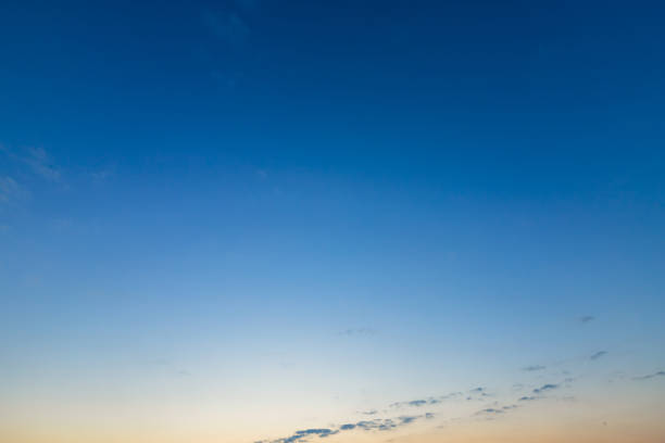 istock blue bright dramatic sunset sky in countryside or beach colorful cloudscape texture air background. 1384994689