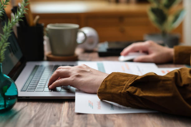 istock close up hand typing on laptop keyboard when woking at home 1384996312