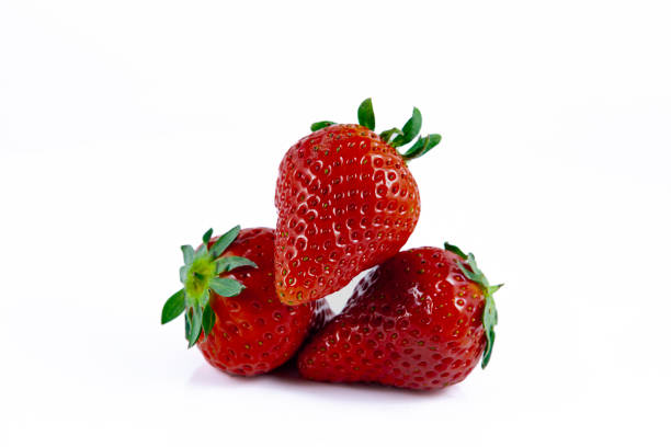 istock Composition of fresh strawberries on a white background. 1384999371