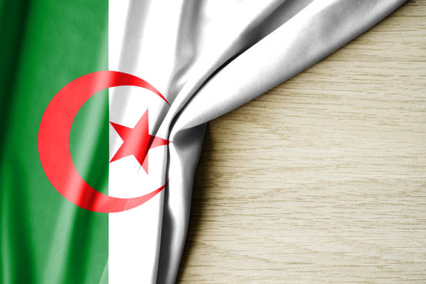 istock Algeria flag. Fabric pattern flag of Algeria. 3d illustration. with back space for text. 1385016531