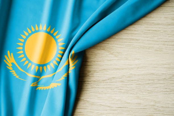 istock Kazakhstan flag. Fabric pattern flag of Kazakhstan. 3d illustration. with back space for text. 1385017582