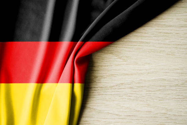 istock Germany flag. Fabric pattern flag of Germany. 3d illustration. with back space for text. 1385018091