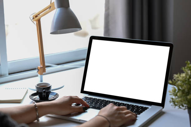 istock Close up view stylish man hands typing on keyboard of laptop computer. 1385042083