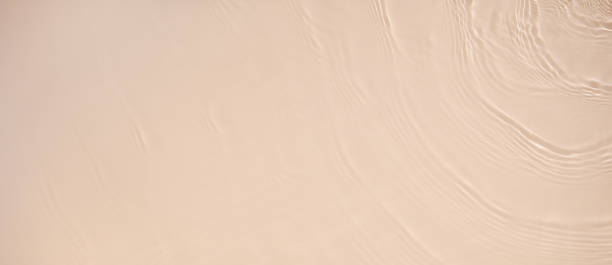 istock banner background transparent beige clear water surface texture 1385042241