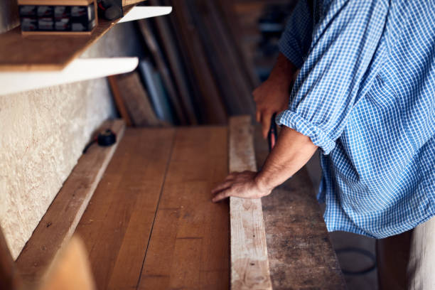 istock Man assembling furniture and fixing it - hobby concept. 1385044822