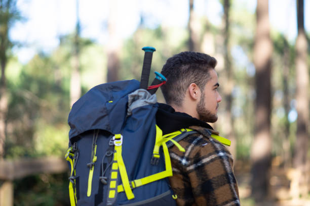 istock Side view of young male hiker 1385044871