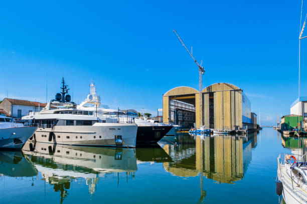 One of the shipyards overlooking the Burlamacca canal of Viareggio, that in the beginning of the 19th century started to build small fishing boats, until reaching the today's international importance